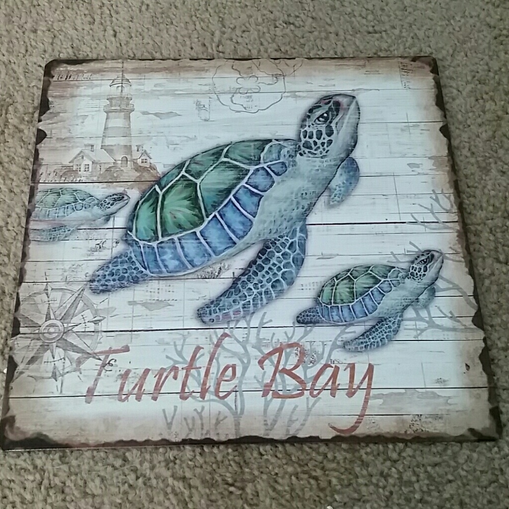 Brand new. Metal Turtle Bay sign